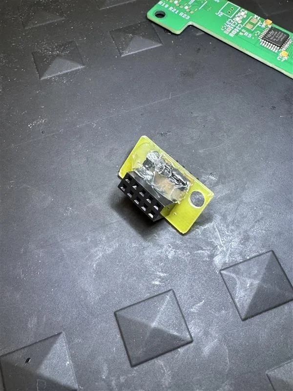 Figure 7: the CNC-made mod board, top side, with a 2×5 female header.