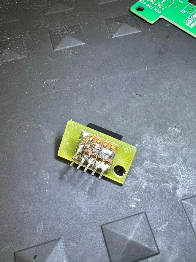 Figure 7: the mod board, underside, showing the header pins soldered through.